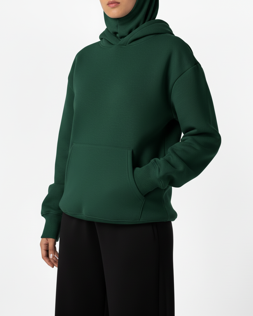 Green hoodie worn by a person on a white background
