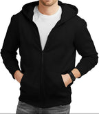Man wearing a black hoodie with a white shirt underneath on a white background